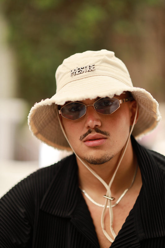 DISTRESSED BEIGE BUCKET HAT